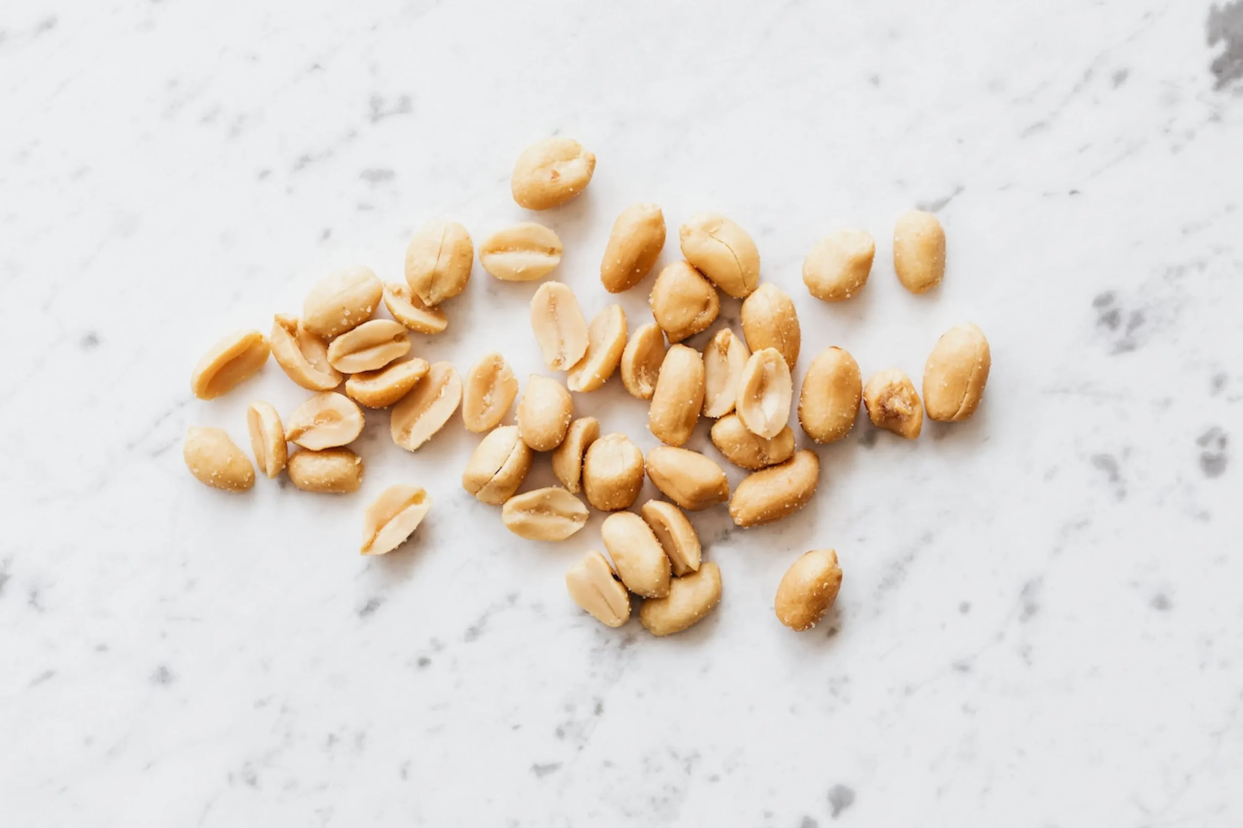 photo of a scattering of salted peanuts