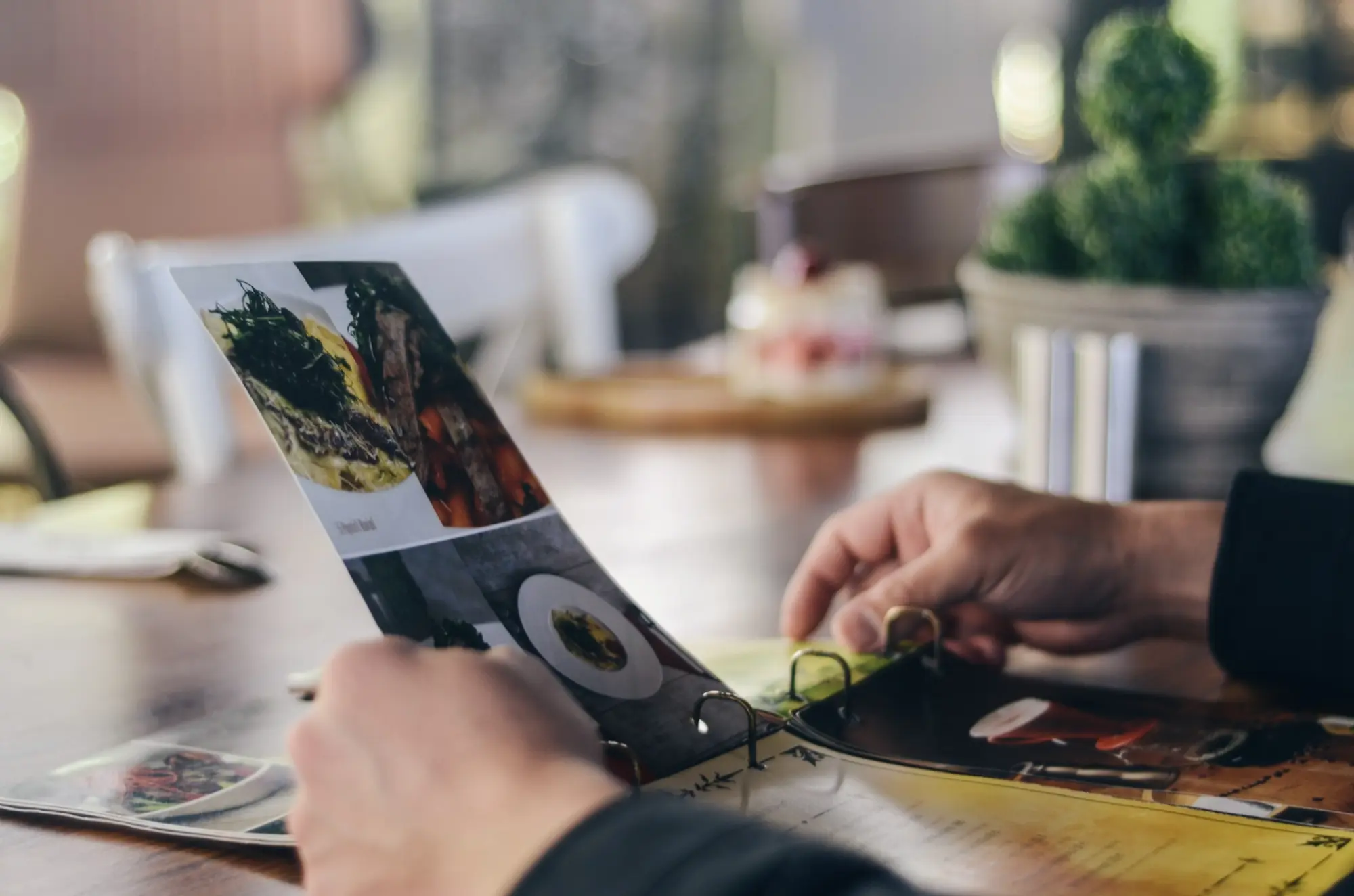 person looking at a menu