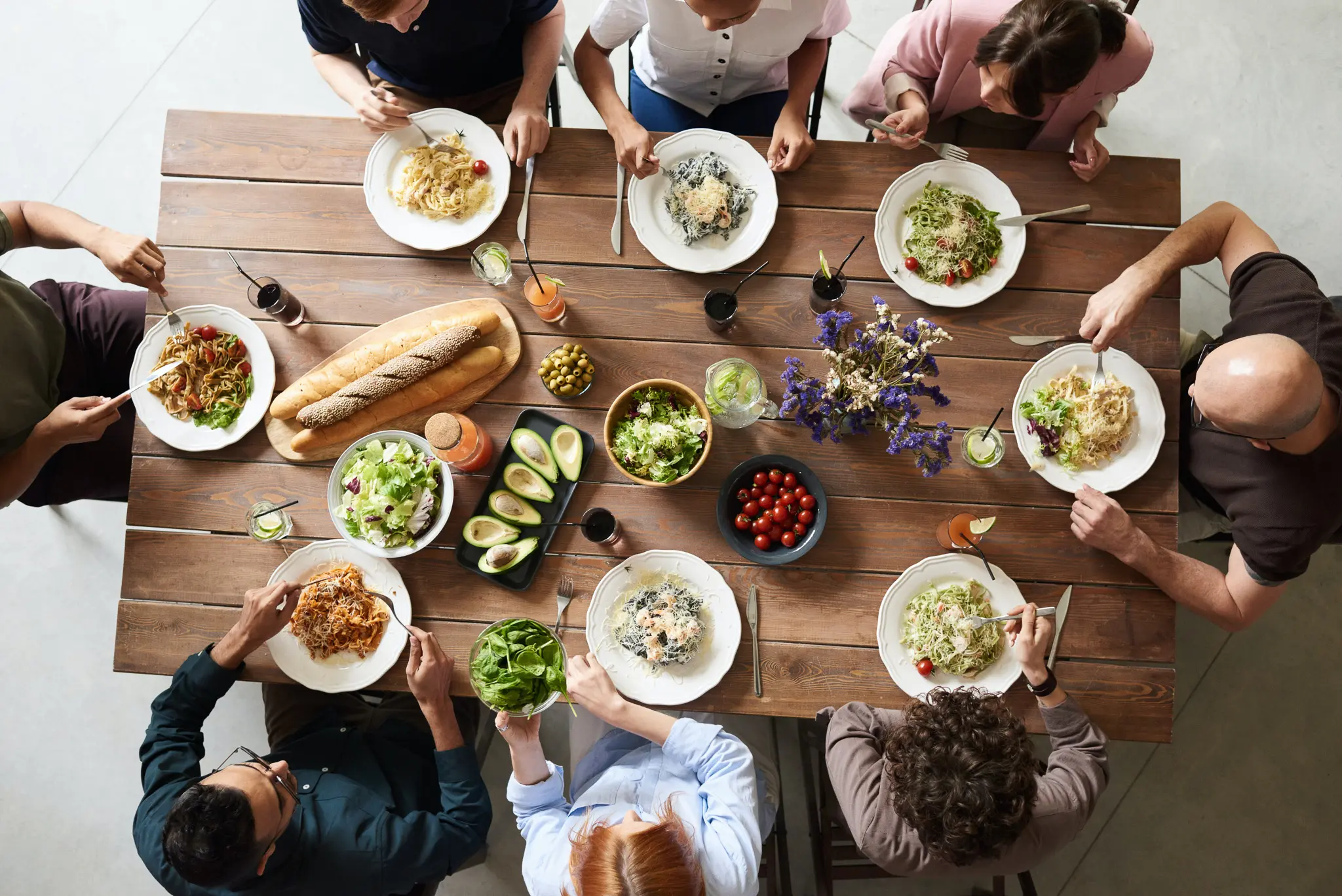 group of people eating from above