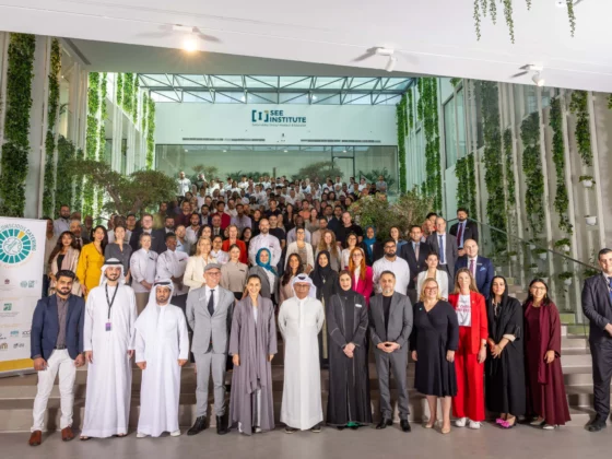 image of a group of people standing posing for a picture as a group