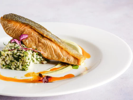 salmon on a plate with vegetables