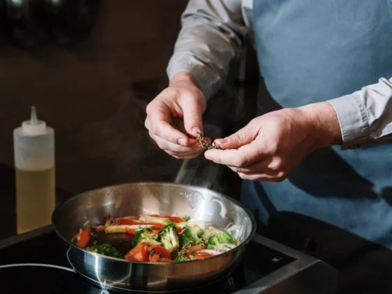 close up of a chef preparing a meal