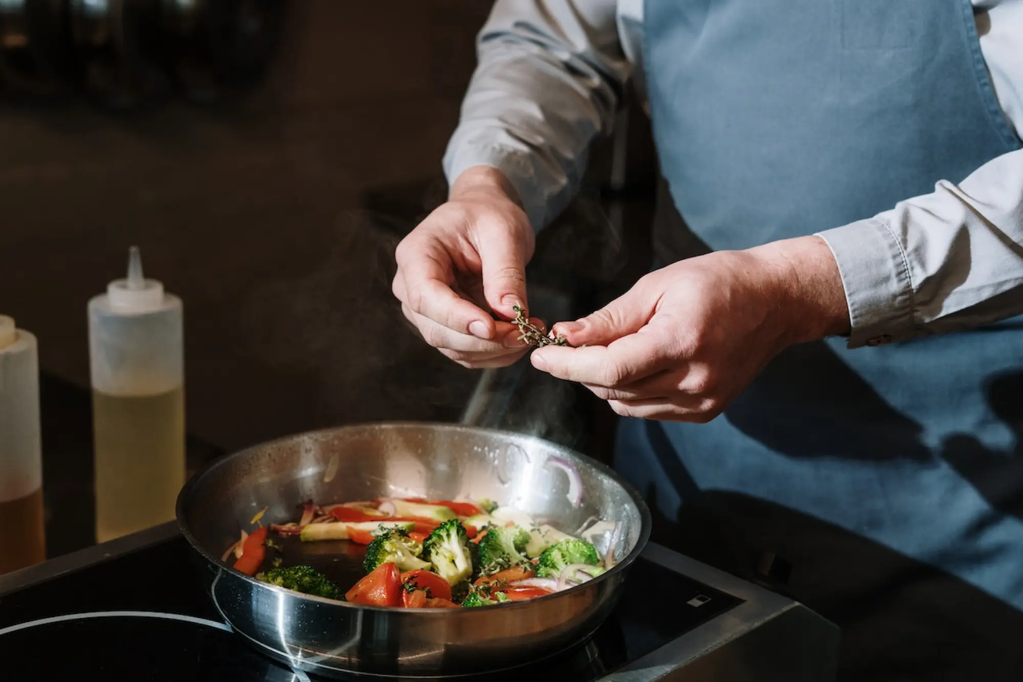 close up of a chef preparing a meal