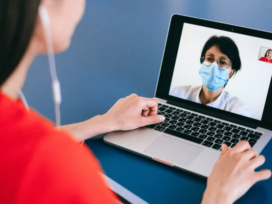 woman on video call with doctor