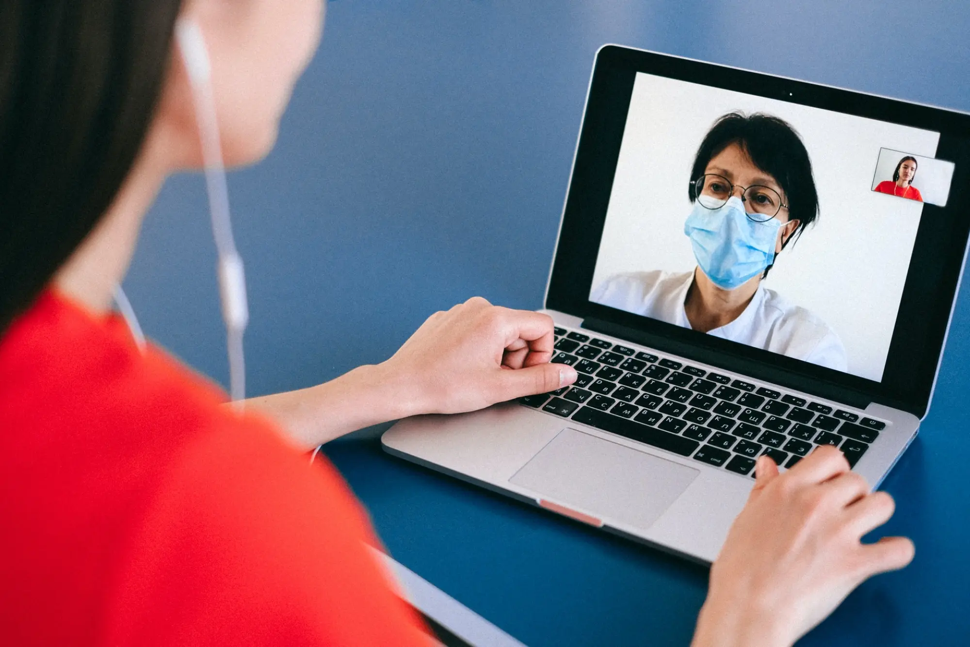 woman on video call with doctor