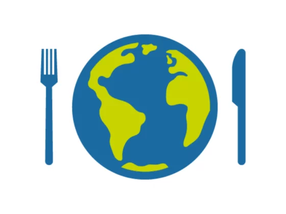 picture of the world as a place mat between a knife and fork