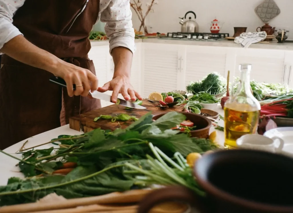 man chopping vegetables