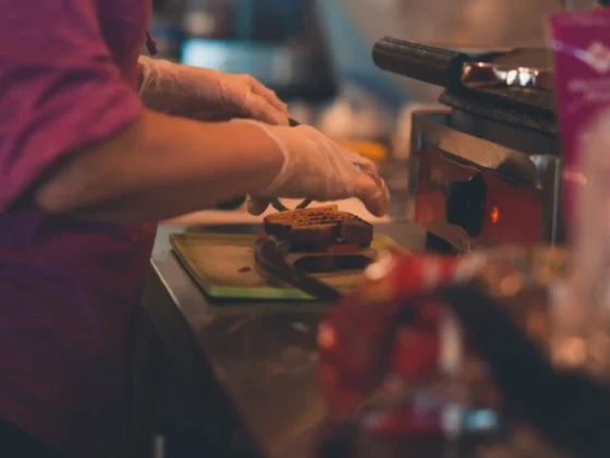 close up of someone working in a coffee shop