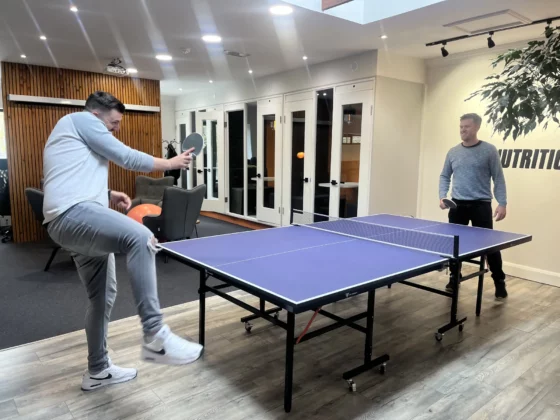 damian and aaron playing table tennis