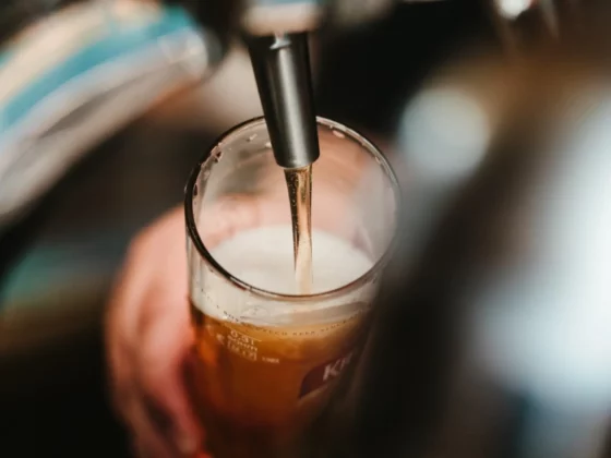 beer being poured from a pump