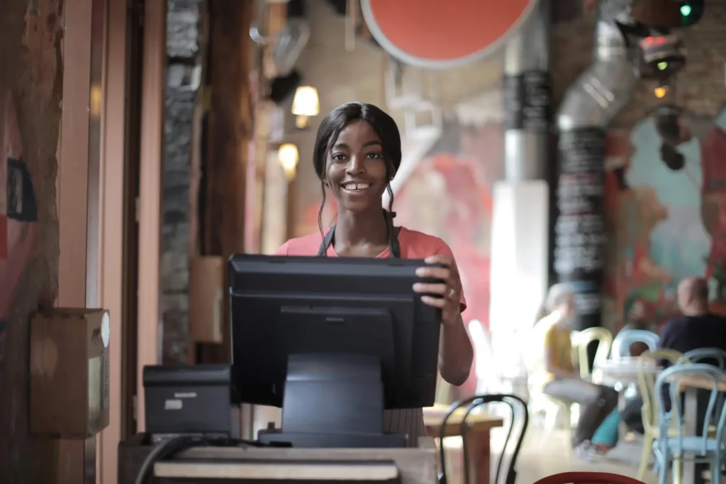 woman at pos in a cafe