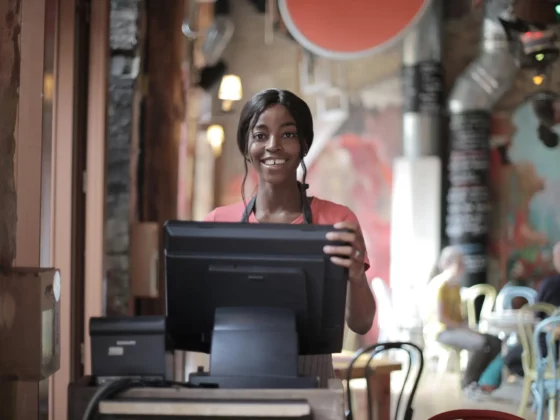 woman at pos in a cafe