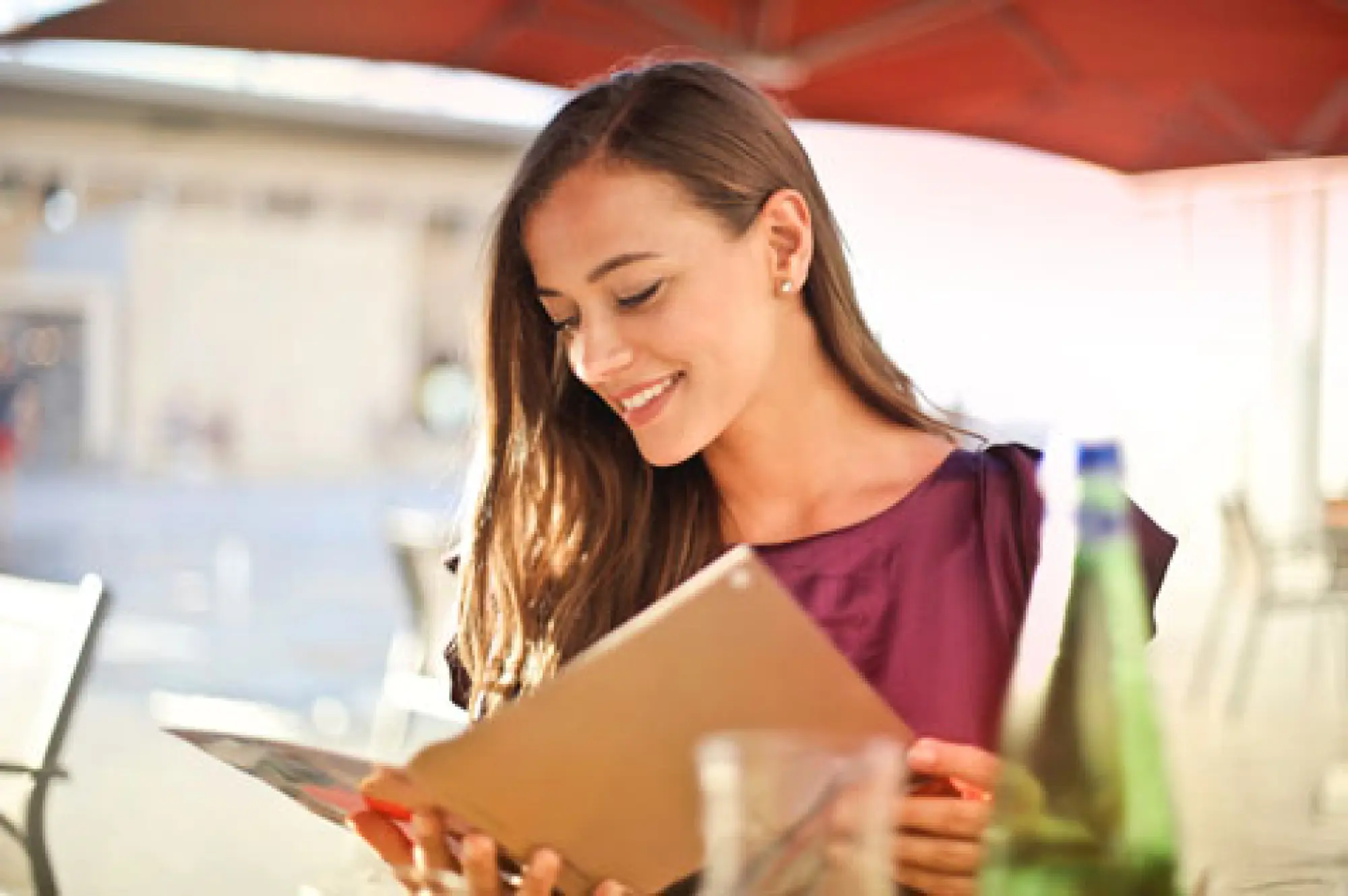 woman looking at menu