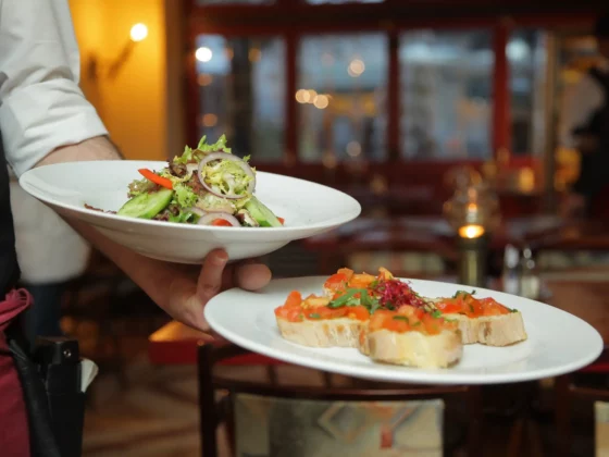 waiter holding plates