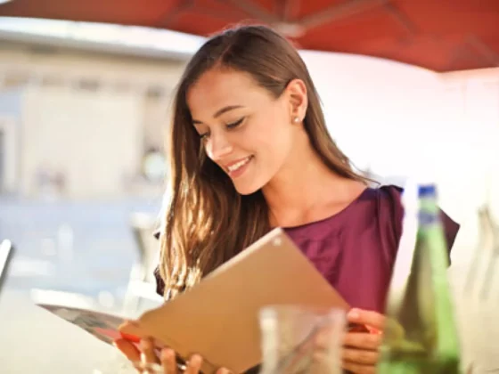 woman looking at menu